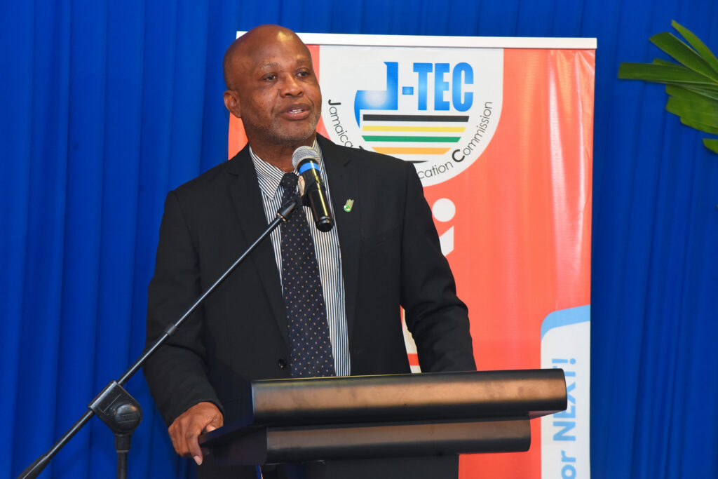 Commissioner and Executive Director of the Jamaica Tertiary Education Commission (J-TEC), Dr. Dameon Black, addresses a ceremony for the presentation of certificates of registration to tertiary institutions, held on Wednesday (November 29) at the Courtleigh Hotel in New Kingston.
